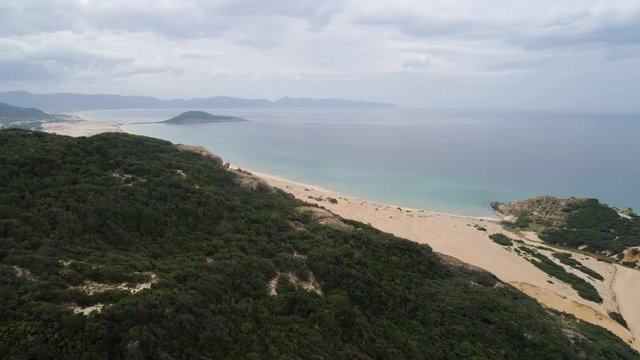 Aerial of Hon Ngang Beach at Dam Mon Peninsula, Van Phong Bay, Van Ninh, Khanh Hoa. 80km north of Nha Trang, is beautiful with its 10km untouched wilderness white sandy beach and crystal clear water