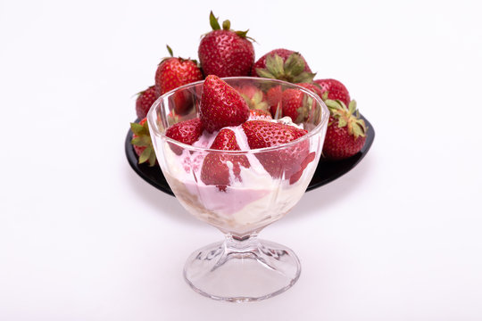 ice cream and fresh ripe strawberries  isolated on white background