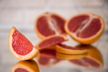 grapefruit slices on a light background close-up