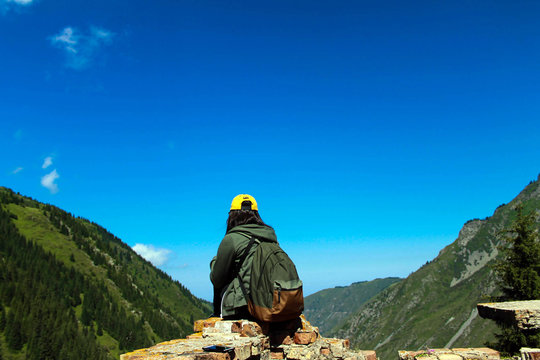 Sitting on the old bricks among the high 
 and beautiful mountain