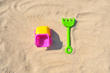 Colorful Beach Toys at a Beach on a Sunny Day