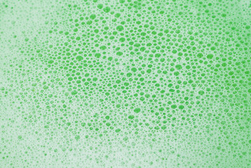 Green lather background, top view.