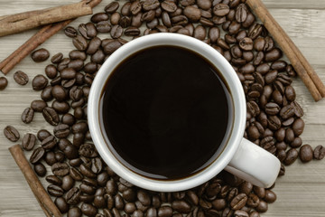 Morning coffee beans with cinnamon