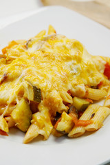 Macaroni with cheese and vegetables