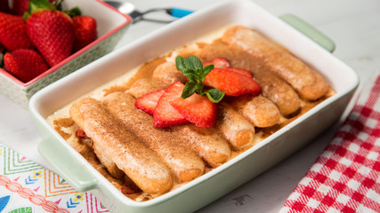 Classic italian tiramisu with strawberries