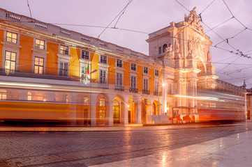 Plakat Panaoramic view Commerce Square, Lisbon with blurry trams.