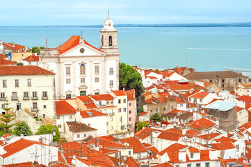 Fototapeta premium View of Saint Stephen Church in Lisbon from Miradouro de Santa Luzia viewpoint, Portugal.