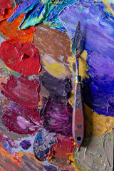 different color oil paint strokes dried on paper. colorful acrylic paint. modern art concept. painter palette