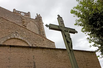 Fototapeten Church and cross. Canal du midi Capestang France. © A