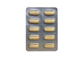 yellow capsule in blister packs isolated on white background