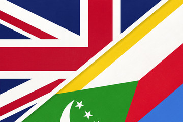 United Kingdom vs Comoros national flag from textile. Relationship between two European and African countries.