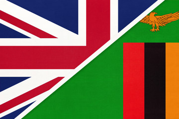 United Kingdom vs Zambia national flag from textile. Relationship between two European and African countries.