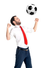 Happy businessman with football