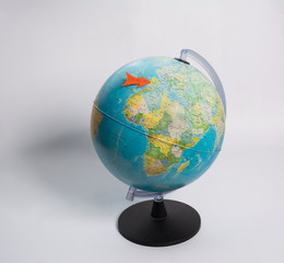 Corona virus on a world globe