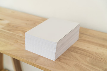 Fototapeta premium Blank catalog, magazines, book on wood background.