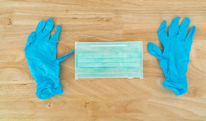 Surgical mask protection against pollution, virus, flu and Coronavirus (COVID-19). Surgical mask and medical gloves.