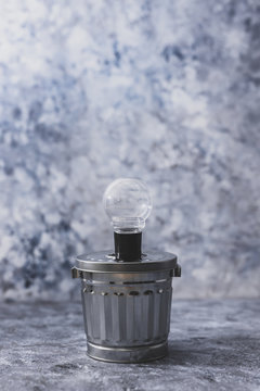 ideas for waste management and recycling concept, light bulb on tp of garbage bin