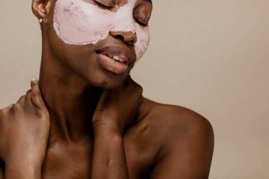 African woman wearing facial mask