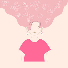 Girl with hair full of leaves and flowers. Feeling fresh.