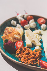 Mediterranean cheese platter with fried haloumi and mould cheese