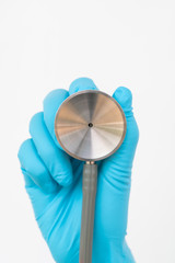 The doctor holding a stethoscope.