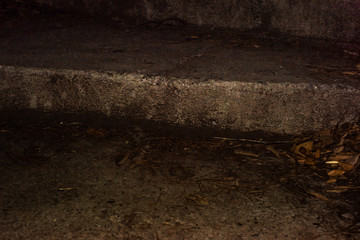 Fototapeta na wymiar Antique stone steps in the dark
