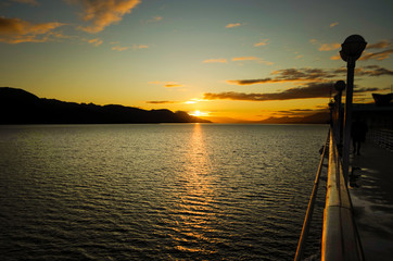 Sunrise or twilight over Beagle Channel in Patagonia between Argentina and Chile from cruiseship or...