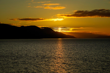 Sunrise or twilight over Beagle Channel in Patagonia between Argentina and Chile from cruiseship or...