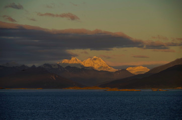 Sunrise or twilight over Beagle Channel in Patagonia between Argentina and Chile from cruiseship or...