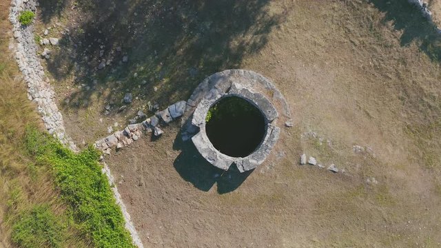Celtic well in Dalmatian hinterland in Promina municipality in Croatian National Park Krka near Oklaj
