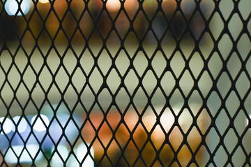 Black iron cage, focus is not clear Blurry on sadness days. Sadness concept, Imprisonment.