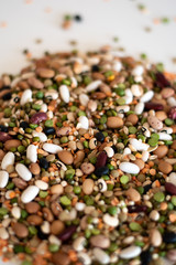 mixed legumes on white surface