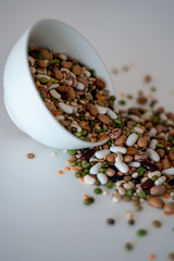 mixed legumes in bowl spilling out