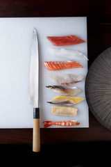 knife and sea food for making sushi