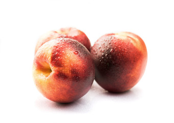Fresh raw nectarine isolated on white