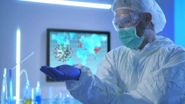 lab technician holding a 3d cgi model of coronavirus,scientist analyze covid-19 cell in laboratory,world infection spread showing on world map