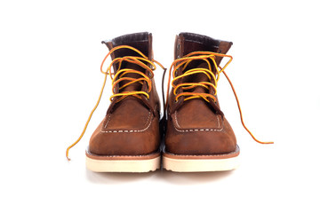 Brown boot on white background.