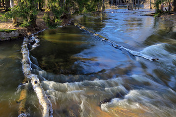 flooded winter river on a sunny day