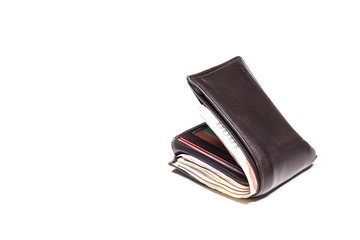 Picture concept with finance and banking. Brown leather wallet with money isolated on white background