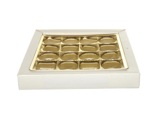 Empty box of gold color from chocolates isolated on a white background.