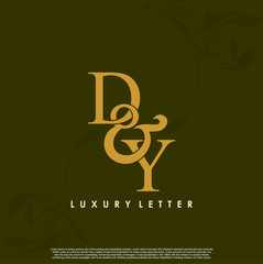 DY logo initial vector mark Gold color.