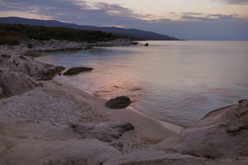 Fototapeta premium night view of one of the sandy and rocky beach in Karidi