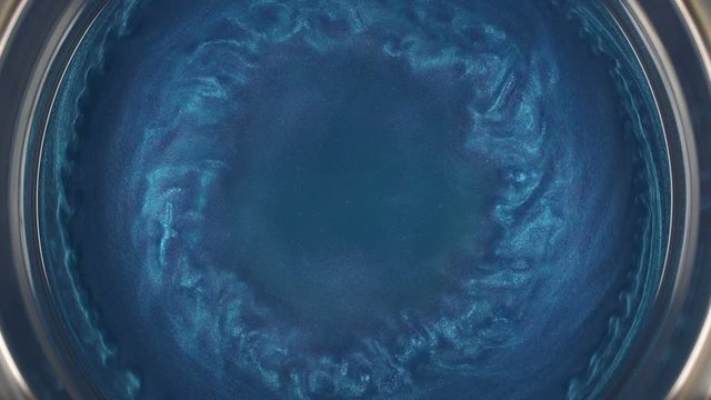 Rheoscopic fluid. Beautiful movement of particles in a liquid. Fantastic patterns and shapes. 50 fps