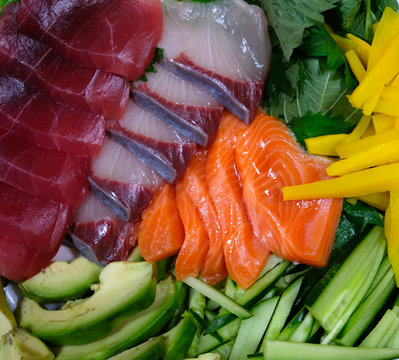 Delicious sashimi prepared for dining on a kitchen table in Tokyo.