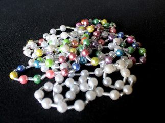 row of colorful Pearl strings abstract background