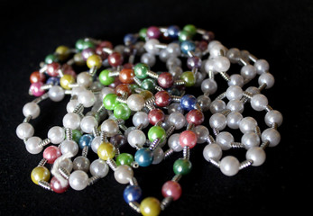 row of colorful Pearl strings abstract background