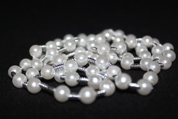 row of Pearl strings abstract background