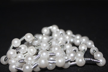 row of Pearl strings abstract background