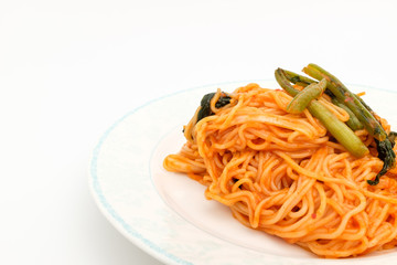 Noodles with radish on a white background