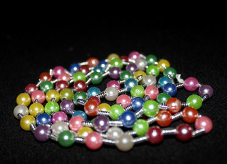 row of colorful Pearl strings abstract background